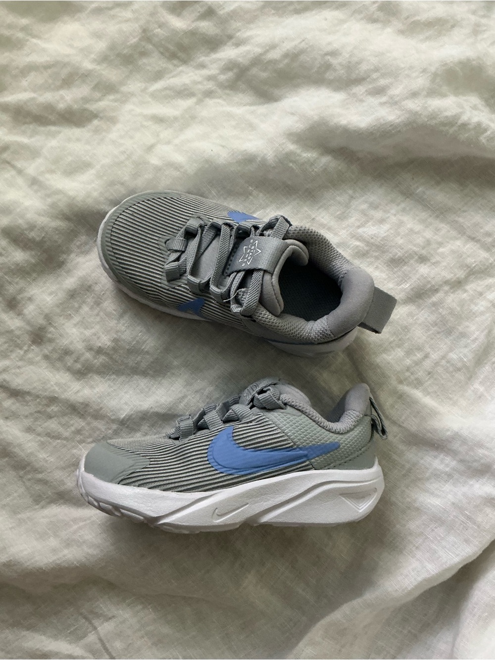 Nike Kids Grey Sneakers with Blue Swoosh